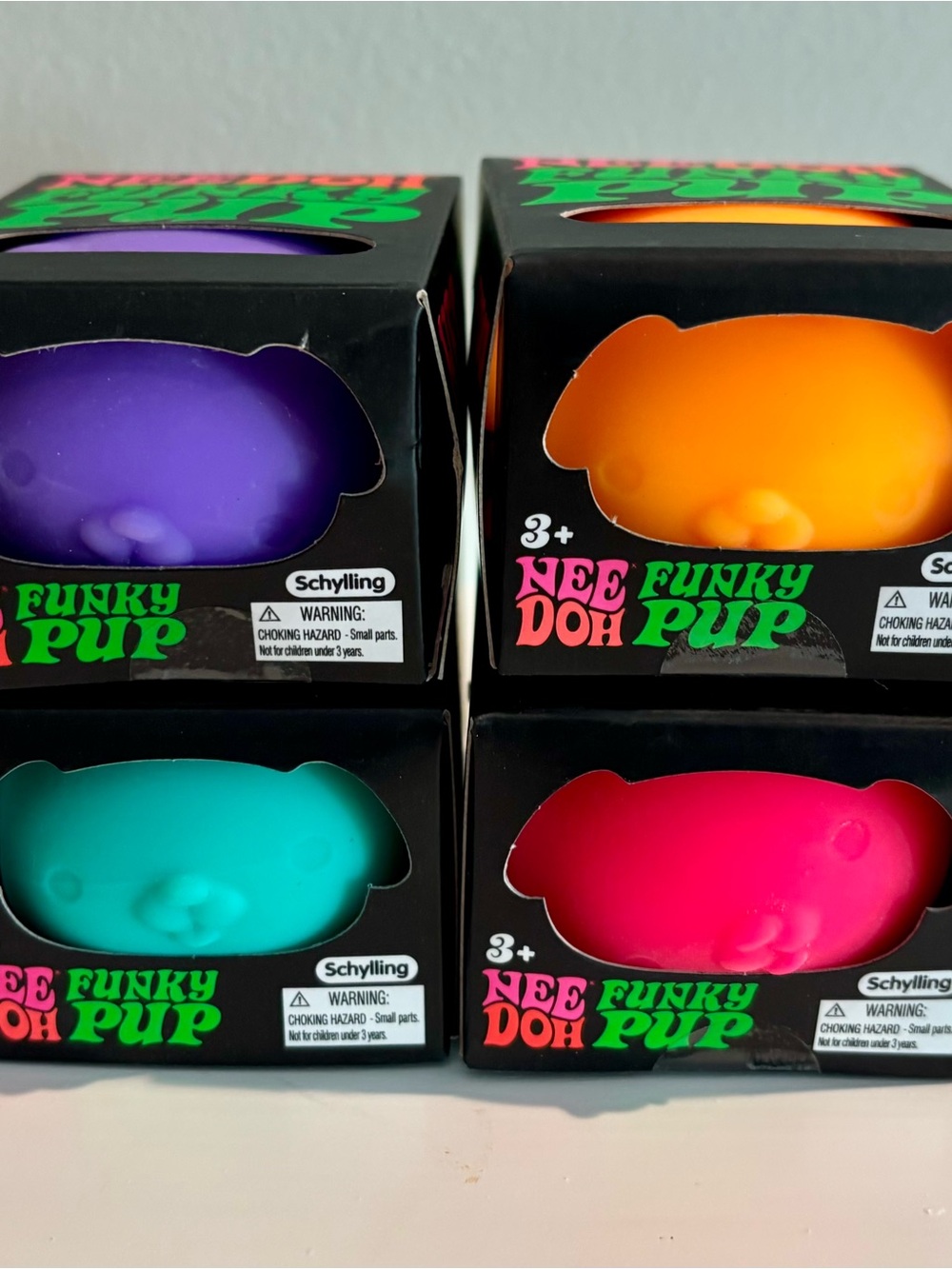 Needoh Funky Pup Toy Lot of 4 - Orange, Teal/Blue, Pink & Purple Schylling
